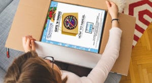 Person opening package containing Chairperson Kit