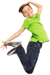Young boy jumping for joy