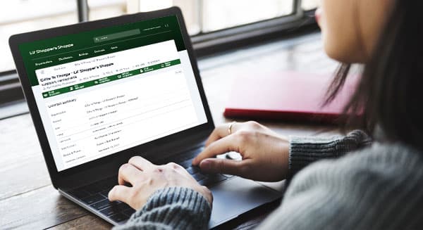 Person on laptop signing up for Lil' Shopper's Shoppe